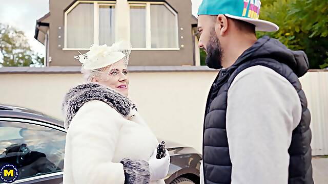 Old slut with huge tits drilled by young deliver guy with huge cock