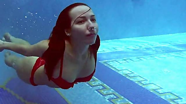 Lina Mercury Russian large bazookas pornstar enjoys swimming pool