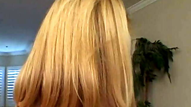 Horny blonde teens fuck each other with a strap-on