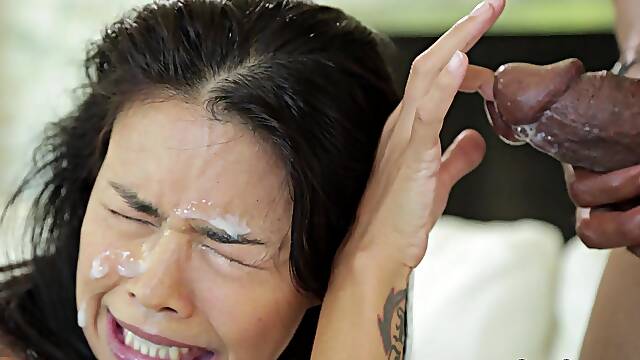 Dana Vespoli moans during rough interracial dicking on the bed